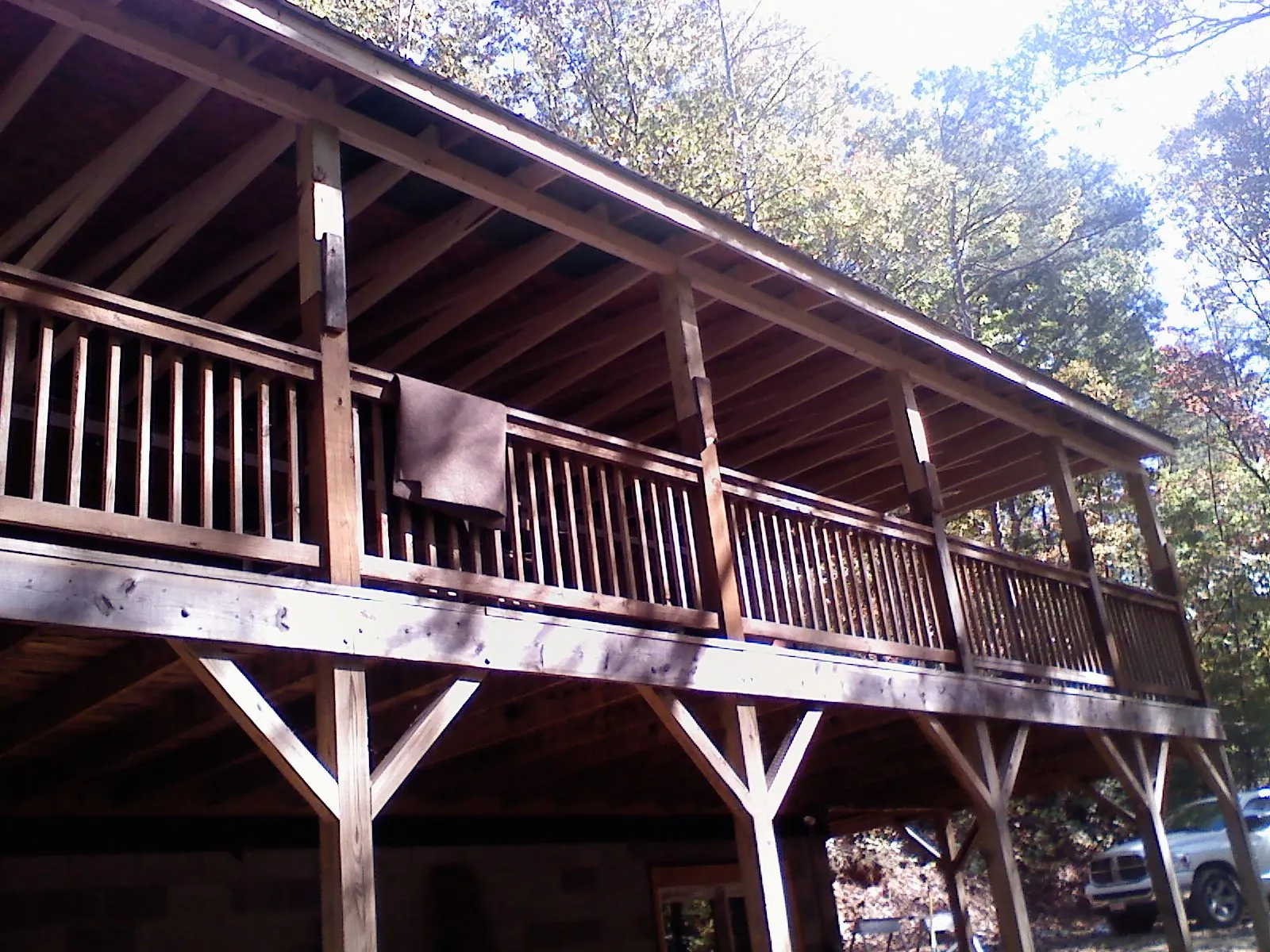 Timber framing under a new elevated porch and deck — Roof Leak Repair in Galveston by Roofing Brothers